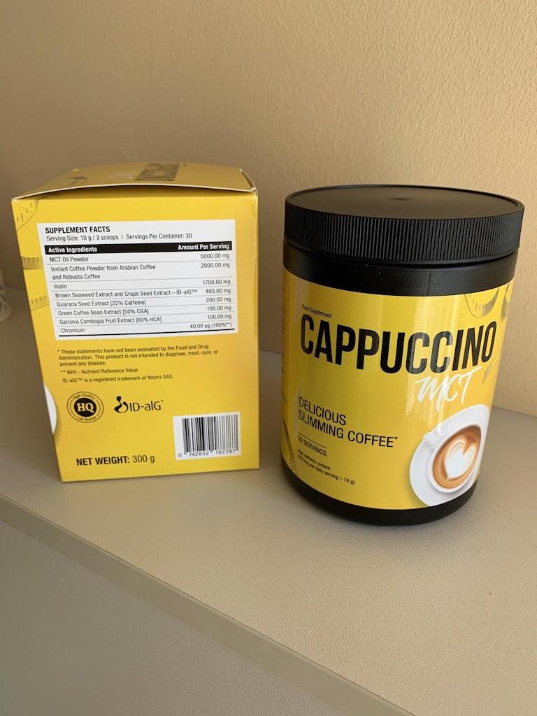 Cappucino MCT 9 a yellow and black bottle and the box.