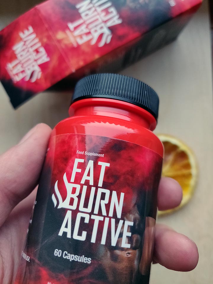 Fat Burn Active 15 black and red bottle and box of pills with white letters.