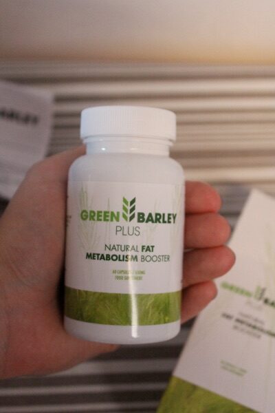 Green Barley Plus 11 white bottle with green letters