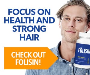 Hair Loss 2 a man holding a bottle of vitamins.