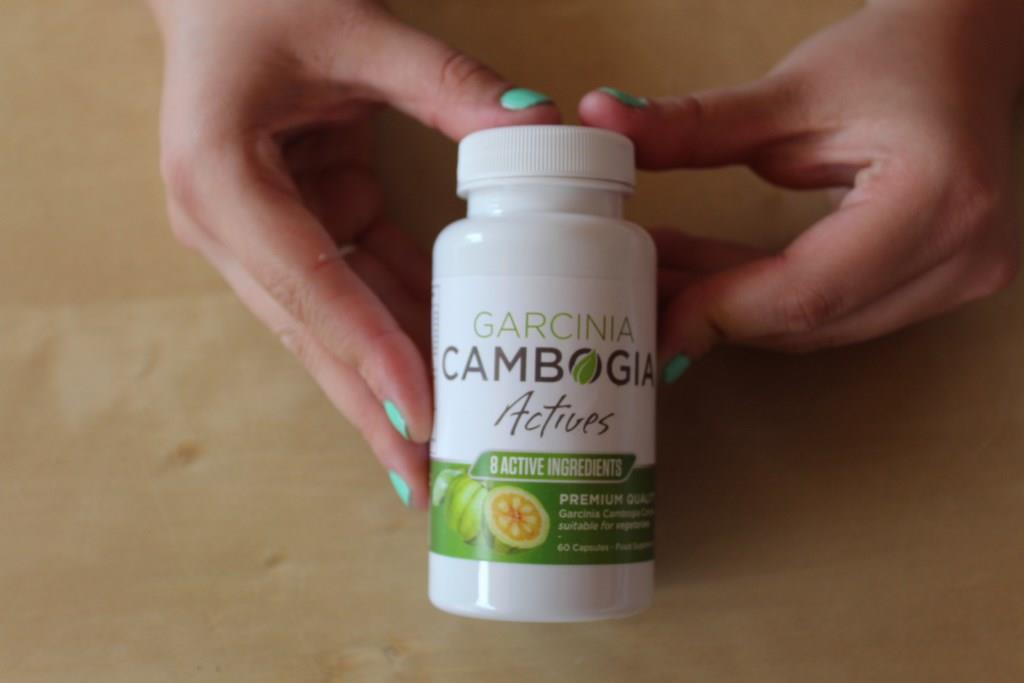 Garcinia Cambogia Actives 3 white supplement bottle with green and white lettering