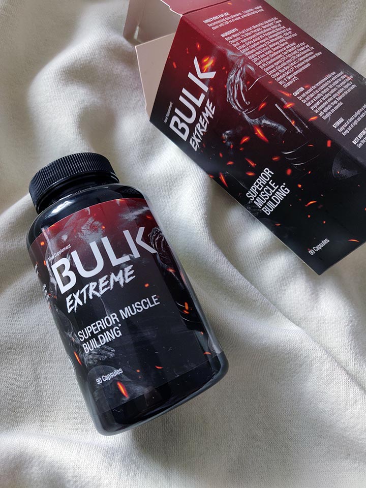 Bulk Extreme 12 Image of a red and black box and packaging with a photo of a supplement bottle and white letters
