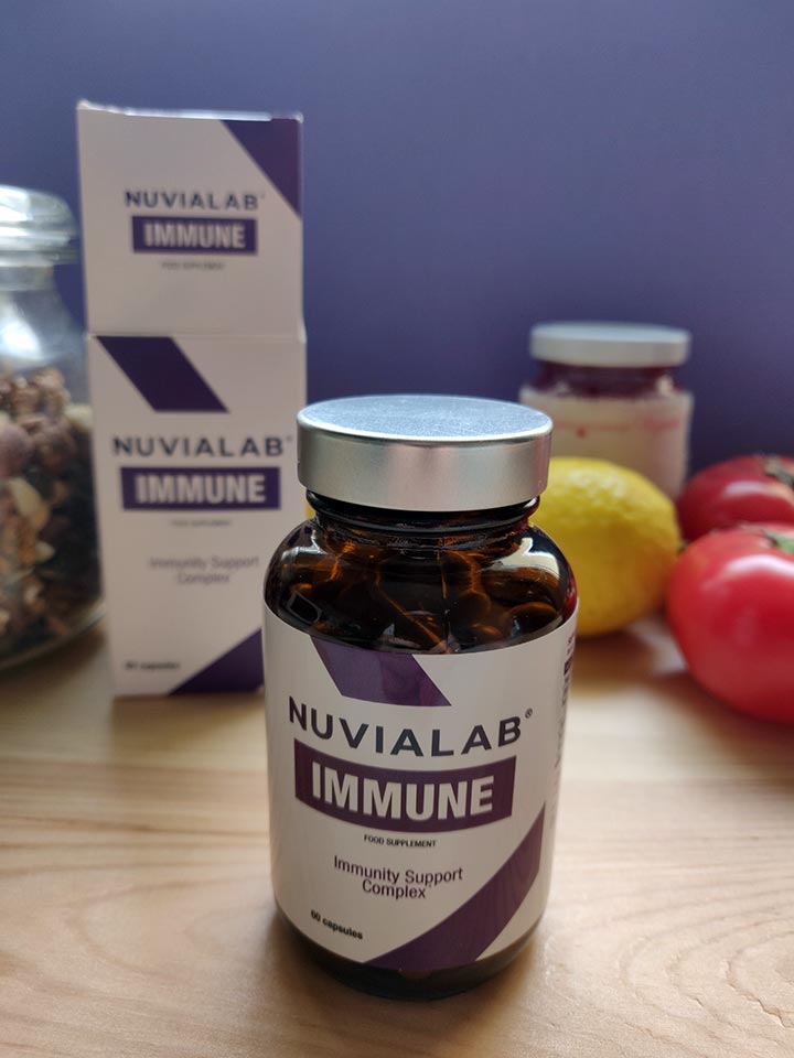 Immunological System 11 medicine bottle packaging with white sticker and lilac letters