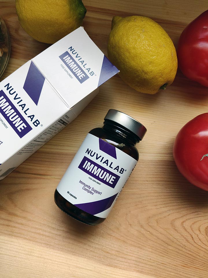 Immunological System 12 medicine bottle packaging with white sticker and lilac letters