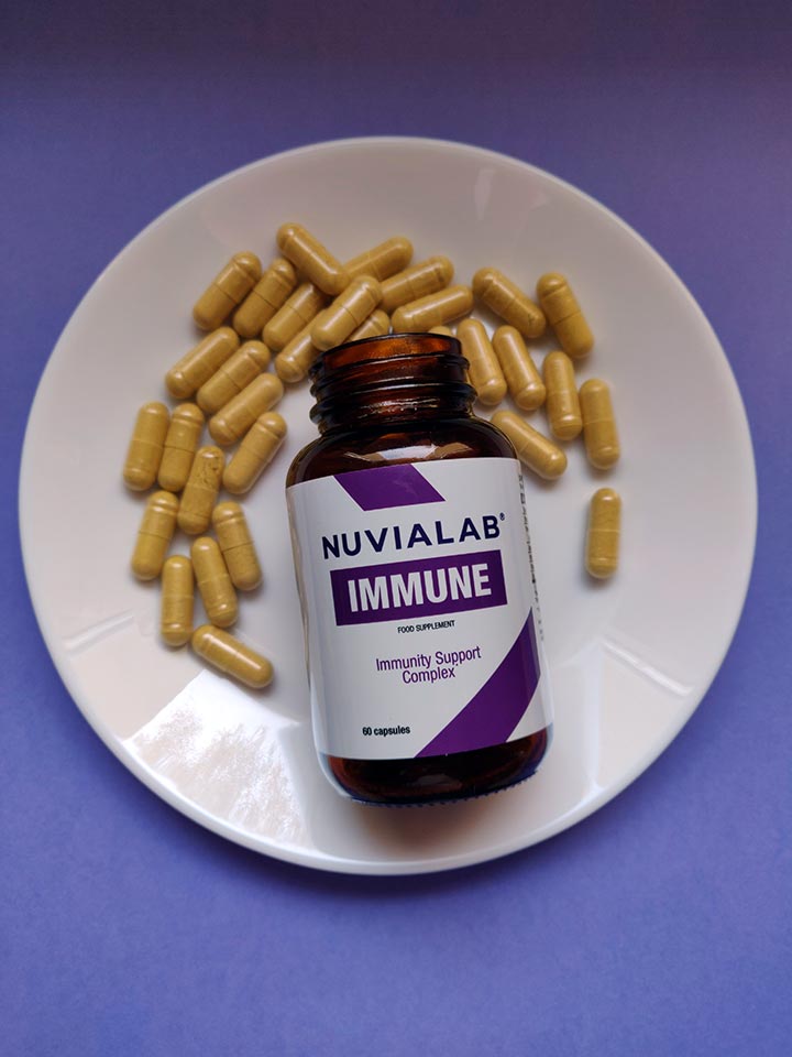 Immunological System 19 medicine bottle packaging with white sticker and lilac letters