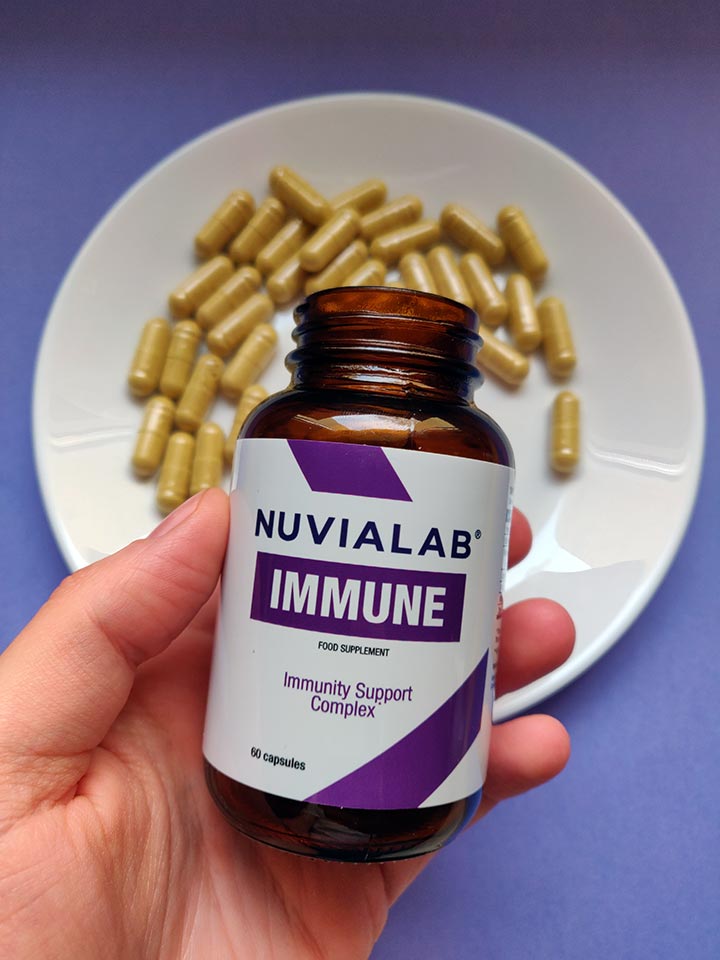 Immunological System 20 medicine bottle with white sticker and lilac letters