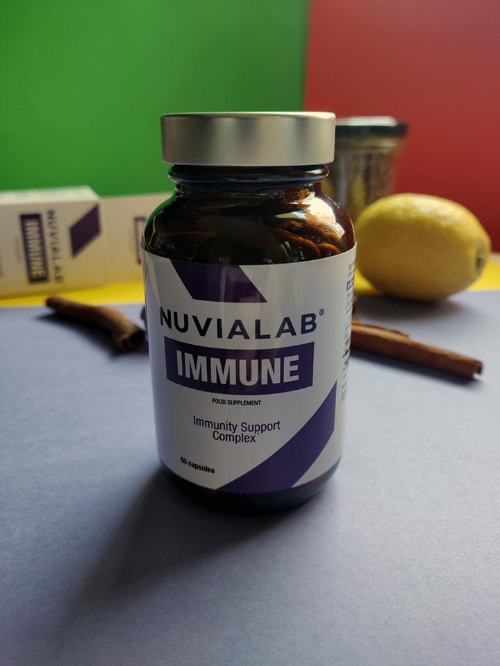 Immunological System 15 medicine bottle with white sticker and lilac letters