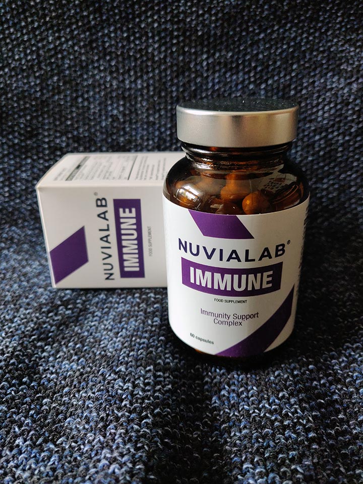 Immunological System 16 medicine bottle packaging with white sticker and lilac letters